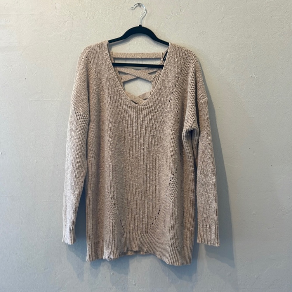 Plus size Torrid knit sweater with strappy back and eyelet details